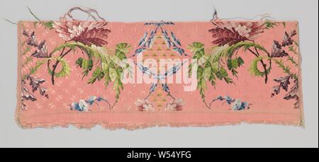 Fragment of silk with a pattern of a multi-colored spiral branch and wine-red carnation on hard pink ground on the Gros de Tours stock, Fragment of silk with a symmetrical pattern that is incomplete in the height of Gros de Tours: two applied bending plume leafy branches in bright green, each make a spiral around a black stem of a carnation in wine red, pink and white (cut off). Purple, sliding chalice flowers on the outside, thin blue tendrils on the inside that enclose diamond fields on which there is green scattering material. The stock is sown in the same color with small motifs such as Stock Photo