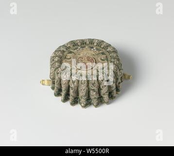 Fair of dark green velvet embroidered in gold and silver thread with the Orry de Vignory family crest, Fair of dark green velvet embroidered in gold and silver thread with the Orry de Vignory family crest (also: Vignori) Model: The flat round bottom is surrounded by a wavy raised edge with holes through which a drawstring of silver thread runs. Lined with goat leather. Decoration: the 20 bulges or 'ribs' are outlined with gold thread. In between, an S-rank and acanthus spiral. At the top and bottom with a French lily or 'fleur de lys'. The bottom is completely filled by a lambrequin in which a Stock Photo