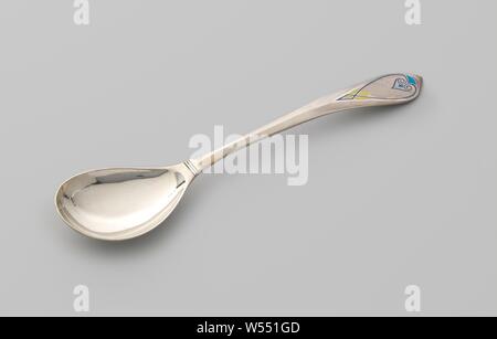 Compôte serving spoon with pear-shaped bowl and handle with a symmetrical pattern in enamel, The pear-shaped bowl gradually merges into the flat, bent handle, which widens to the pointed oval, curling end. At the feed from tray to handle, the spoon is guided at the top and sides by a double profile. A rib runs over the center of the stem, splitting at the end to enclose a droplet-shaped field. This field is decorated with a symmetrical pattern of lines and surfaces in two colors of blue and yellow enamel champlevé., Johannes Blinxma, Amsterdam, 1931, silver (metal), l 25.8 cm × w 6 cm × d 2.6 Stock Photo