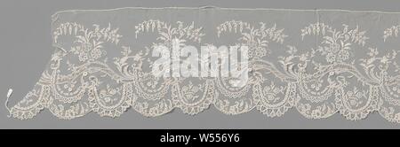 Dressing gown from application side with wavy tendril and bellflower branches, Dressing gown from Brussels application side, bobbin lace with needle lace decorative stitches, attached appliqué on machine tule. The strip is made as the middle strip of three strips for a crinoline gown. There is a continuous pattern on the strip with a left-over undulating leaf tendril. Three rosette flowers spring from each wave top and a large branch with bell flowers bending to the right. There are always two richly decorated garlands hanging under one wave, forming the deep scallops. The motifs are made in Stock Photo