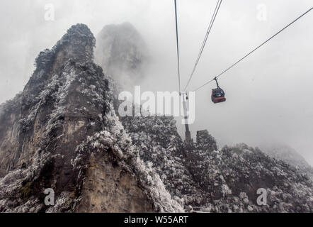 Landscape of the snow-covered Tianmen Mountain in Zhangjiajie city, central China's Hunan province, 16 February 2019. Stock Photo