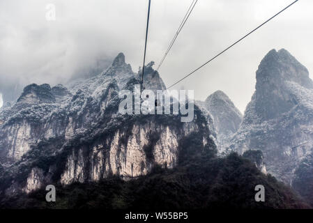 Landscape of the snow-covered Tianmen Mountain in Zhangjiajie city, central China's Hunan province, 16 February 2019. Stock Photo