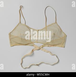 Brassiere with a Low-Cut Back Beige tulle bra with low back closure, Beige  tulle bra with low back closure for under evening dress. Horizontal seam  across the cups. Elastic shoulder straps (not