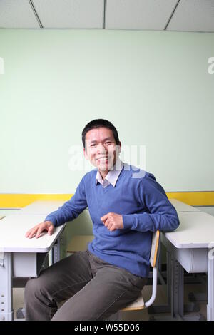 --FILE--Zhang Bangxin, chairman of TAL Education, poses for a photo in Beijing, China, 19 October 2012.   An equity investment firm has agreed to pay Stock Photo