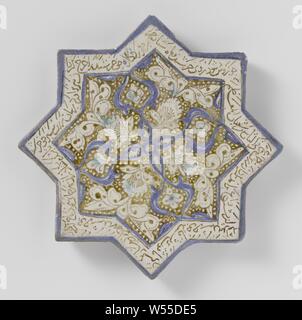 Star-shaped tile with an inscription and floral scrolls, star-shaped tile of quartz fritware, painted in underglaze blue, green-blue and luster with a text in Persian or Arabic script, including four palmettes and saved floral scrolls., anonymous, Kashan, c. 1266 - c. 1267, glaze, cobalt (mineral), luster (textile), vitrification, d 19.7 cm × t 1.5 cm Stock Photo