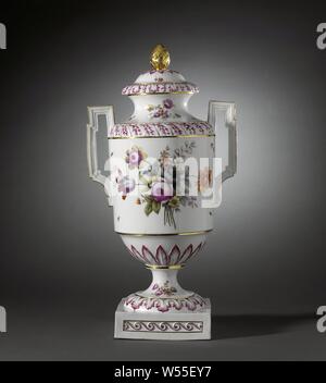 Covered vase with birds on a branch and bouquets, Porcelain covered vase on a spreading foot ending in a square base and with a cylindrical body with round shoulder and narrowing towards the foot. Spreading neck with a flat edge and high, angular ears. Painted on the glaze in blue, red, pink, green, yellow, purple, black and gold. On the belly two birds on a branch in a landscape and a bouquet of different flowers. In between scattered flowers and insects. The narrowing part to the foot with a band with modeled raised leaf motifs in relief. The shoulder and the foot with the same decoration as Stock Photo