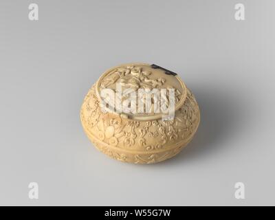 Tobacco box, Round box with flattened ball shape, and round lid with gold-plated silver hinge. The outside is horizontally divided into two friezes, on which alternating cartouches and weapon trophies with guns, banners, armor and drums. The cartouches in the lower zone contain a small representation of a sailing ship (below the hinge), a country house, a walled fortress by the sea, and a landscape with houses, in the upper zone the cartouches are filled with identical garlands. Between each cartouche and trophy is always a shell design with a hanging and a stylized hanging leaf design. Stock Photo