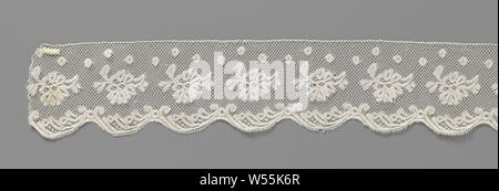 Strip of bobbin lace with anemones. On a coarse mesh foundation (square mesh) there is a walking pattern of freestanding anemones above a slightly varied leaf scallop. The strip consists of five sections sewn together and was sewn to a strip in 1966 with a similar but not identical pattern. Valenciennes lace., anonymous, Sluis (possibly), c. 1850 - c. 1874, linen (material), Valenciennes lace, l 425 cm × w 9 cm ×, 7 cm Stock Photo