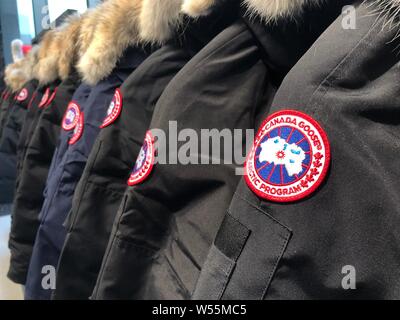 --FILE--Winter jackets are for sale at the flagship store of Canada Goose at the Taikoo Li Sanlitun shopping center in Beijing, China, 24 January 2019 Stock Photo