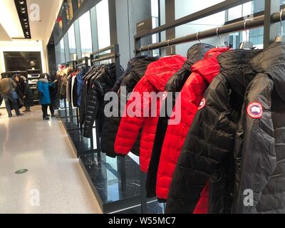 --FILE--Winter jackets are for sale at the flagship store of Canada Goose at the Taikoo Li Sanlitun shopping center in Beijing, China, 24 January 2019 Stock Photo