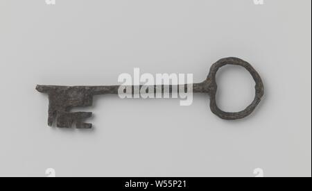 Key with bean-shaped eye and quadrilateral shaft, ending beyond the beard., 1300 - 1500, iron (metal), l 20.8 cm × w 5.8 cm Stock Photo