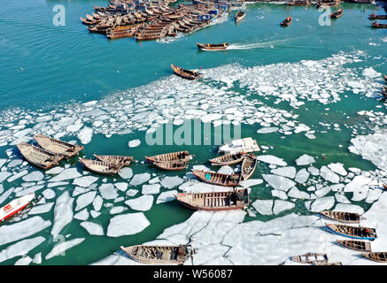 Aerial view of massive fishing ships and boats trapped on the frozen water of Bohai Sea in Dalian city, northeast China's Liaoning province, 14 Februa Stock Photo