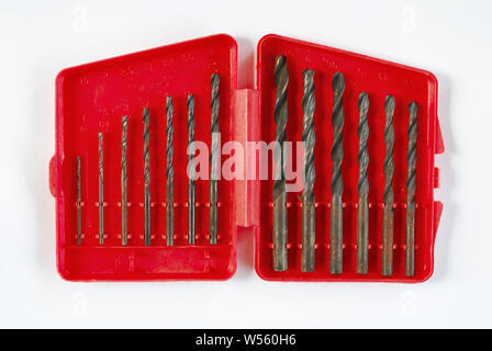 Drill bits of various sizes isolate on white background Stock Photo