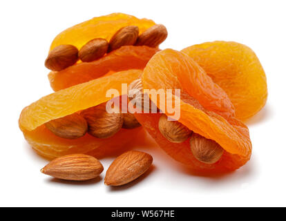 Dried apricots with almonds isolated on white background Stock Photo