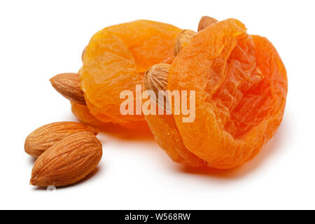 Dried apricots with almonds isolated on white background Stock Photo