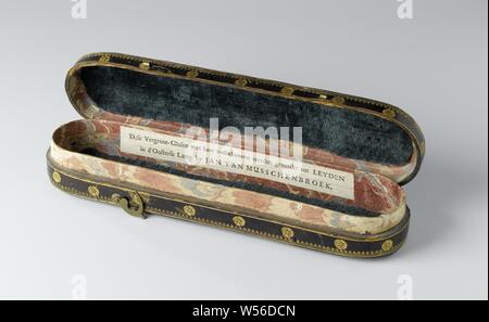 Glasses box of thick paper covered with dark brown leather and printed with gilded floral ornaments, Glasses box in an elongated shape with rounded corners, of thick paper covered with dark brown leather and printed with gilded floral ornaments. On the lid a border of fine flower vines that frames a rectangular surface with symmetrically arranged oriental-looking motifs. Around the side of the box a path with some stylized flowers. A printed double diamond pattern adorns the bottom of the box, which has been left undecorated. Closure by means of two copper hooks and eyes, one of which is Stock Photo