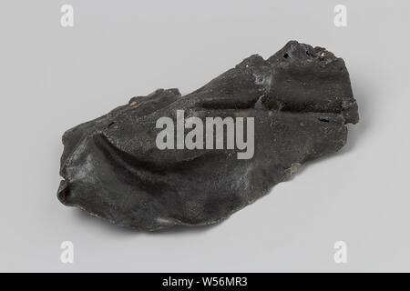 Fragment of a lead plate from the wreck of the East Indies' t Vliegend Hart, Piece of flat lead, bumped, without holes. Sheet fragments, Dutch East India Company, 't Vliegend Hart (ship), Middelburg, 1729 - 2-Mar-1735, h 3.2 cm × w 16 cm × d 8.3 cm Stock Photo