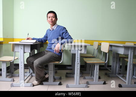 --FILE--Zhang Bangxin, chairman of TAL Education, poses for a photo in Beijing, China, 19 October 2012.   An equity investment firm has agreed to pay Stock Photo