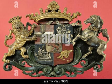 Weapon from M.A. de Ruyter, Crowned wooden coat of arms, worn by a crowned golden lion and a crowned silver horse and resting on two green dolphins, completely carved in relief and polychromed., Michiel Adriaansz. de Ruyter, Angel de Ruyter, anonymous, Netherlands, in or after 1676 - in or before 1683, wood (plant material), h 38.5 cm × w 55 cm × t 6 cm Stock Photo