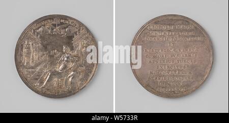 Russia joins the anti-Turkish alliance between the Emperor, Poland, and Venice, Silver Medal. Front: Concordia with four arrows and a horn of plenty sitting between two colonnade with four coats of arms on pillars, above which two clasped hands with branches of victory and inscription. Reverse: inscription, Moscow, Lazarus Gottlieb Lauffer, Neurenberg, 1687, silver (metal), striking (metalworking), d 4.5 cm × w 33.40 Stock Photo