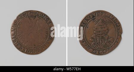 Birth of Philip, son of Charles V, calculation token commenced by Margaret of Austria, governor of the Netherlands, copper medal. Front: double-headed eagle with crown inside the inscription. Reverse: globe above bouquet of daisies, protected by celestial light within a circle, Valladolid, Charles V of Habsburg (German emperor and king of Spain), Philip II (king of Spain), governor of the Netherlands Margaret of Austria, anonymous, Netherlands, 1527, copper (metal), striking (metalworking), d 2.8 cm × w 3.53 Stock Photo