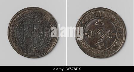 Willem van Oranje, at the twenty-second chapter of the Order of the Golden Fleece in Antwerp, appointed knight of the order, Silver Medal. Obverse: crowned coat of arms, hanging with the order of the Golden Fleece within the girth. Reverse: four cross-arranged lilies within a circle, Antwerp, Willem I (Prince of Orange), Order of the Golden Fleece, anonymous, 1556, silver (metal), striking (metalworking), d 3.1 cm × w 56 Stock Photo