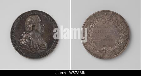 Seven years of existence of the Society for the Promotion of Cooperative in Amsterdam, medal awarded to N. Holtius, member since the founding of the society by P.H. Themmen, Silver Medal. Front: man's bust inside the inside. Reverse: inscription within laurel wreath and inscription, Amsterdam, Phoebus Hitzerus Themmen, N. Holtius, Society for the Promotion of Cow vaccination, Johannes Michiel Lageman, 1810 - 1-Nov-1810, silver (metal), engraving, d 3.4 cm × w 15.42 Stock Photo