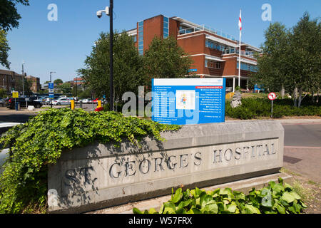 Outside front exterior of Saint Georges Hospital in Tooting, London. UK. Saint Georges in tooting is the main hospital of St George’s University Hospitals NHS Foundation Trust. (111) Stock Photo