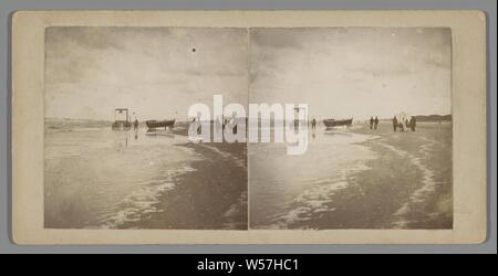 The beach of Scheveningen with a boat and a bath cart, The Hague and environs, Along the Schevenings Beach (title on object), Scheveningen, anonymous, unknown, 1890 - 1900, photographic paper, cardboard, albumen print, h 76 mm × w 154 mm h 88 mm × w 178 mm Stock Photo