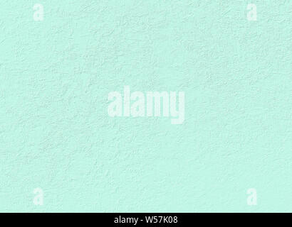 delicate light green stucco wall useful as a background Stock Photo