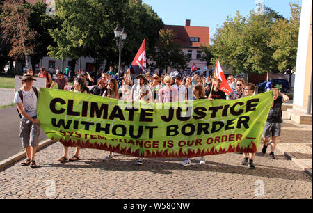 Magdeburg, Germany. 26th July, 2019. Pupils and students demonstrate with protest posters for more climate protection. The Magdeburg Fridays for Future movement had called for the first Climate Moon during the summer holidays. Credit: Peter Förster/dpa-Zentralbild/dpa/Alamy Live News Stock Photo