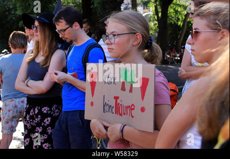 26 July 2019, Germany (German), Magdeburg: Pupils demonstrate with protest posters for more climate protection. The Magdeburg Fridays for Future movement had called for the first Climate Moon during the summer holidays. Photo: Peter Förster/dpa-Zentralbild/dpa Stock Photo