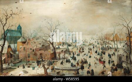 Winter Landscape with Ice Skaters Winter Landscape with Ice Skaters Winter Landscape with Skaters, Winter landscape with ice entertainment. Village scene with many figures on the ice: skaters, kolf players, walkers. On the right a sleigh, on the left a church, winter landscape, symbolizing winter (the four seasons of the year), skates (winter sports), sledge, sleigh (winter sports), 'kolf' on the ice, church (exterior), hay-stack, Hendrick Avercamp, c. 1608, panel, oil paint (paint), support: h 77.3 cm × w 131.9 cm Stock Photo