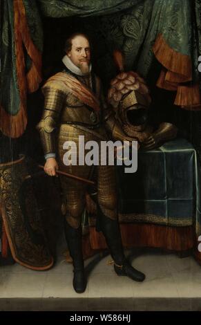 Maurits, Prince of Orange (1567-1625) Portrait of Maurice, Prince of Orange Portrait of Maurits (1567-1625), Prince of Orange, Portrait of Maurits, Prince of Orange. Standing, full-length, in armor. On the left a targe, on the right a table with a helmet and glove. In the right hand a command staff, armor, commander-in-chief, general, marshal, historical persons, Maurits (Prince of Orange), Michiel Jansz van Mierevelt, c. 1613 - c. 1620, panel, oil paint (paint), support: h 220.3 cm × w 143.5 cm sight size: h 218.2 cm × w 141.7 cm Stock Photo