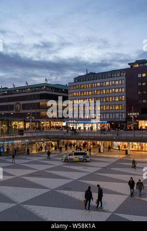 Editorial 28.3.2019 Stockholm Sweden Sergels Torg square at evening with police car patrolling Stock Photo