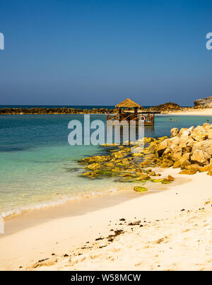 Idyllic beach in Labadee Island, Haiti. Exotic wild tropical beach with white sand and clear turquoise water Stock Photo