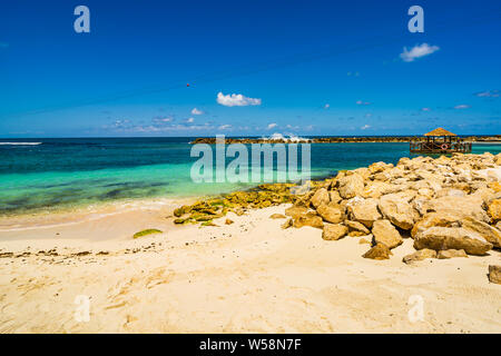 Idyllic beach in Labadee Island, Haiti. Exotic wild tropical beach with white sand and clear turquoise water Stock Photo