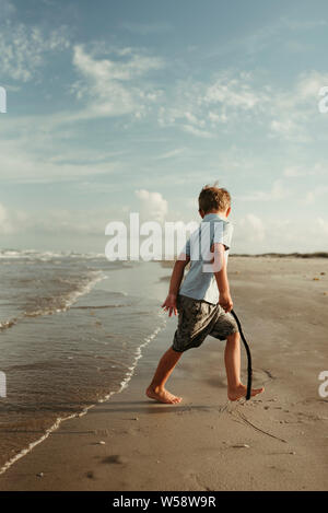 Boy Running Playing on Beach in Corpus Christi Texas