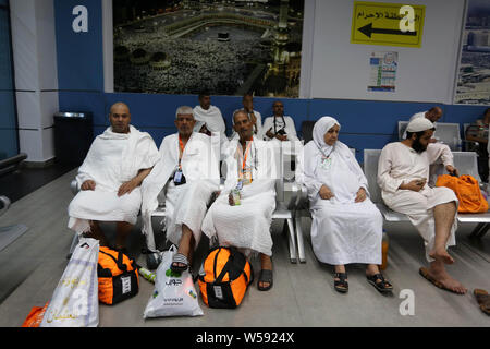 July 26, 2019, Rafah, Sinai, Egypt: The journey of Palestinian pilgrims to attend the annual pilgrimage to Mecca (Hajj) from the Rafah crossing border to Jeddah airport through Egypt's Cairo airport, July 25, 2019. The Hajj (pilgrimage) is an annual Islamic pilgrimage to Mecca, Saudi Arabia, the holiest city for Muslims, and a mandatory religious duty for Muslims that must be carried out at least once in their lifetime Credit: Ashraf Amra/APA Images/ZUMA Wire/Alamy Live News Stock Photo