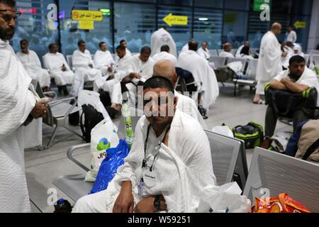 July 26, 2019, Rafah, Sinai, Egypt: The journey of Palestinian pilgrims to attend the annual pilgrimage to Mecca (Hajj) from the Rafah crossing border to Jeddah airport through Egypt's Cairo airport, July 25, 2019. The Hajj (pilgrimage) is an annual Islamic pilgrimage to Mecca, Saudi Arabia, the holiest city for Muslims, and a mandatory religious duty for Muslims that must be carried out at least once in their lifetime Credit: Ashraf Amra/APA Images/ZUMA Wire/Alamy Live News Stock Photo