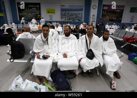 July 26, 2019, Rafah, Sinai, Egypt: The journey of Palestinian pilgrims to attend the annual pilgrimage to Mecca (Hajj) from the Rafah crossing border to Jeddah airport through Egypt's Cairo airport, July 25, 2019. The Hajj (pilgrimage) is an annual Islamic pilgrimage to Mecca, Saudi Arabia, the holiest city for Muslims, and a mandatory religious duty for Muslims that must be carried out at least once in their lifetime Credit: Ashraf Amra/APA Images/ZUMA Wire/Alamy Live News Stock Photo