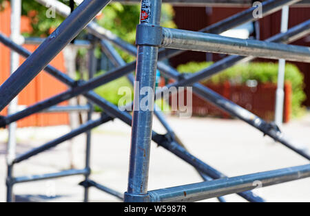 Umea, Sweden - June 24, 2019: scaffolding mounted on Roback for repainting facade Stock Photo