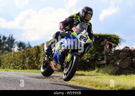 Armoy Northern Ireland. 26th July, 2019. Armoy Road Races The Race of Legends; qualifying; Derek Sheils gets airborne on the Burrows Engineering/RK Racing Suzuki Credit: Action Plus Sports/Alamy Live News Stock Photo