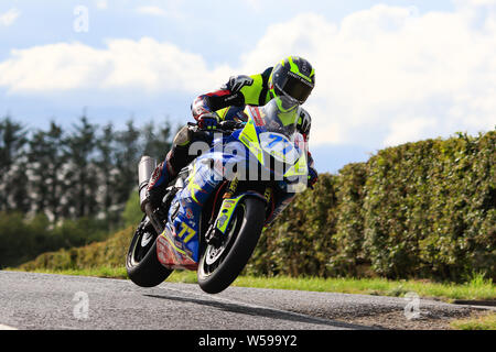 Armoy Northern Ireland. 26th July, 2019. Armoy Road Races The Race of Legends; qualifying; Tom Weeden catches some air on the Burrows Engineering/RK Racing Suzuki Credit: Action Plus Sports/Alamy Live News Stock Photo