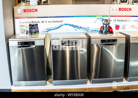 inside Bosch showroom, silver inox Bosch SuperSilence dishwashers on  display for sale, produced by BSH Home Appliances Stock Photo - Alamy