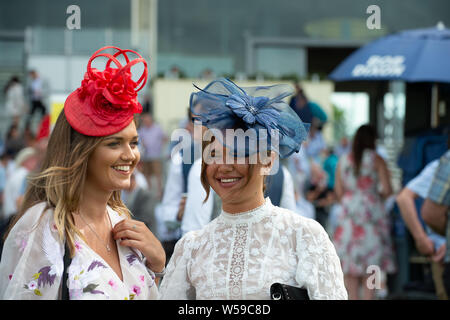 The QIPCO King George Weekend, Ascot Racecourse, Ascot, UK. 26th July, 2019. Smiles and fascinators at Ascot Races. Credit: Maureen McLean/Alamy Stock Photo