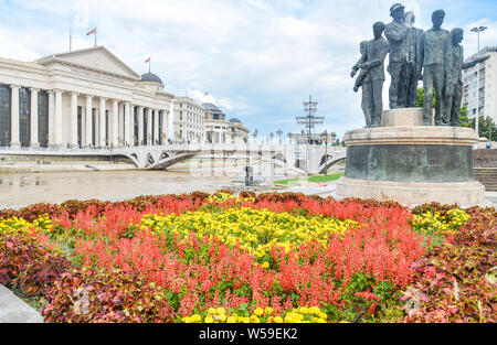 SKOPJE,REPUBLIC OF NORTH MACEDONIA-AUGUST 27 2018: Vibrant flowers displayed before the Museum of Archaeology,a popular landmark along the Vardar rive Stock Photo