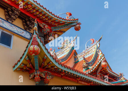 Colorful roof of Vihara Satya Dharma, Chinese Buddhist temple, honoring Tianhou Mazu, Chinese sea goddess. Benoa port, Bali, Indonesia. Stock Photo
