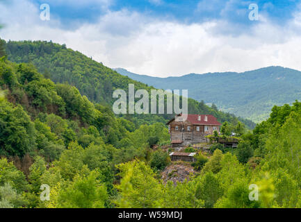 One old wooden house in forest near ilica waterfall, Pinarbasi, Kastamonu Stock Photo