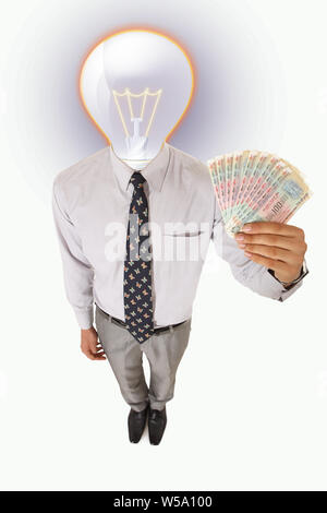 Businessman with energy saving lightbulb on head Stock Photo